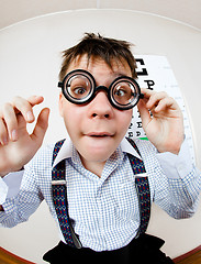 Image showing person wearing spectacles in an office at the doctor