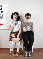 Image showing Two person wearing spectacles in an office at the doctor