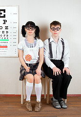 Image showing Two person wearing spectacles in an office at the doctor