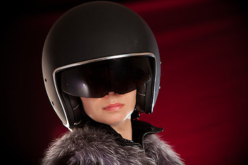 Image showing Biker girl in a helmet