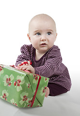 Image showing young baby with gift