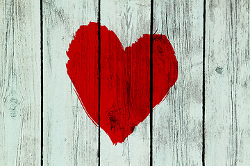 Image showing love symbol on old wooden wall