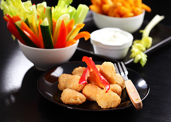 Image showing Chili cheese nuggets with raw vegetable