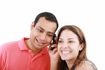 Image showing Young couple sharing mobile phone, portrait, close up