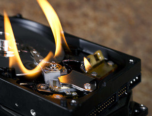 Image showing flames on open hard drive