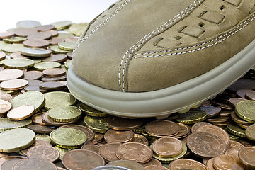 Image showing leasure leather shoe walking on money