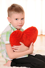 Image showing child with a plush heart