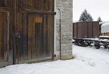 Image showing old railroad depot and railway cars