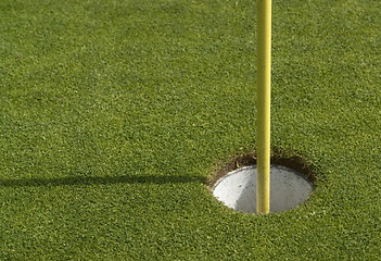 Image showing golf hole and stack inside