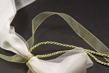 Image showing decorative white and green bow