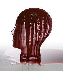 Image showing bloody glass head