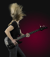 Image showing playing bass guitar