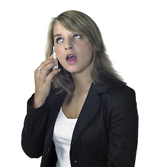 Image showing cute blonde girl talking at mobile phone