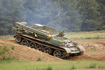 Image showing tank on hilly ground