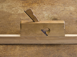 Image showing planer on wooden plank