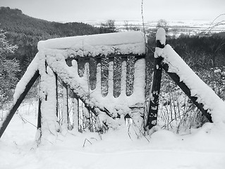 Image showing snow covered rustic gate