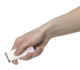 Image showing hand holding a remote control