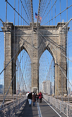 Image showing walking over Brooklyn Bridge