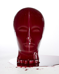 Image showing bloody glass head