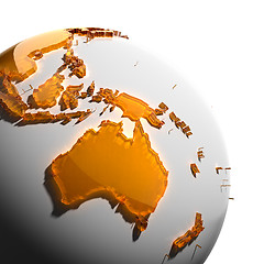 Image showing A fragment of the Earth with continents of orange glass