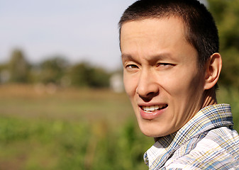 Image showing man looking at camera outdoors