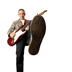 Image showing rocker with guitar and foot