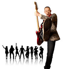 Image showing punk man with the guitar and silhouette