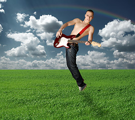 Image showing hippie girl with the guitar outdoor