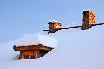 Image showing Attic Window and Two Chimneys in Winter