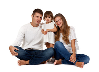 Image showing happy family sitting in the studio