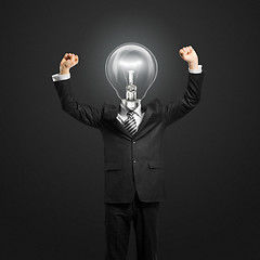 Image showing lamp-head businessman with hands up