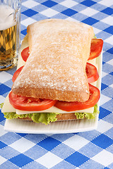 Image showing Italian panino sandwich and beer