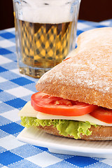 Image showing Italian panino sandwich and beer