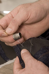 Image showing detail of sewing hand