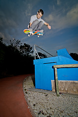 Image showing Skateboarder flying