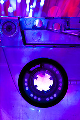 Image showing Transparent Cassette tape and disco light background