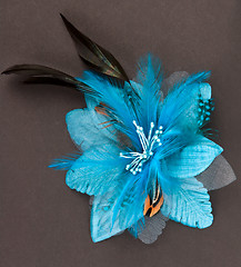 Image showing blue flower fabric with a pen