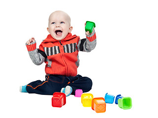 Image showing little boy with a plastic pyramid in the studio