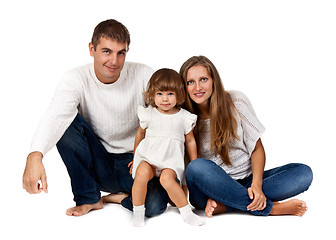 Image showing happy family sitting in the studio