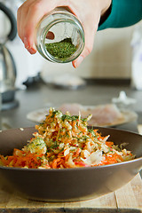 Image showing chef making salad