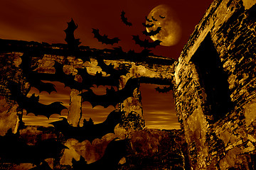 Image showing Happy Halloween. Bats are flying over the old ruin. Dramatic toned