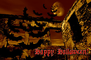 Image showing Happy Halloween. Bats are flying over the old ruin. Dramatic toned