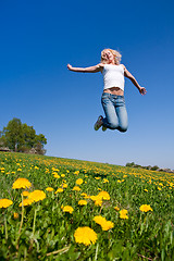 Image showing happy young woman on meadow