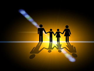 Image showing In the light. Family silhouette in the center of the light
