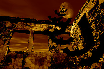 Image showing Happy Halloween. Bats are flying over the old ruin. Dramatic toned