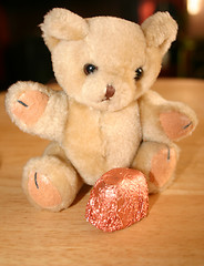 Image showing teddy with its favourite chocolate