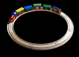 Image showing wooden toy train on tracks
