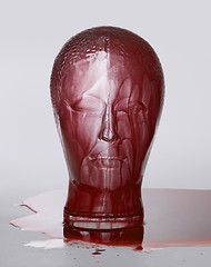 Image showing bloody glass head