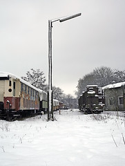 Image showing old railway cars at winter time