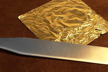 Image showing gold leaf and blade